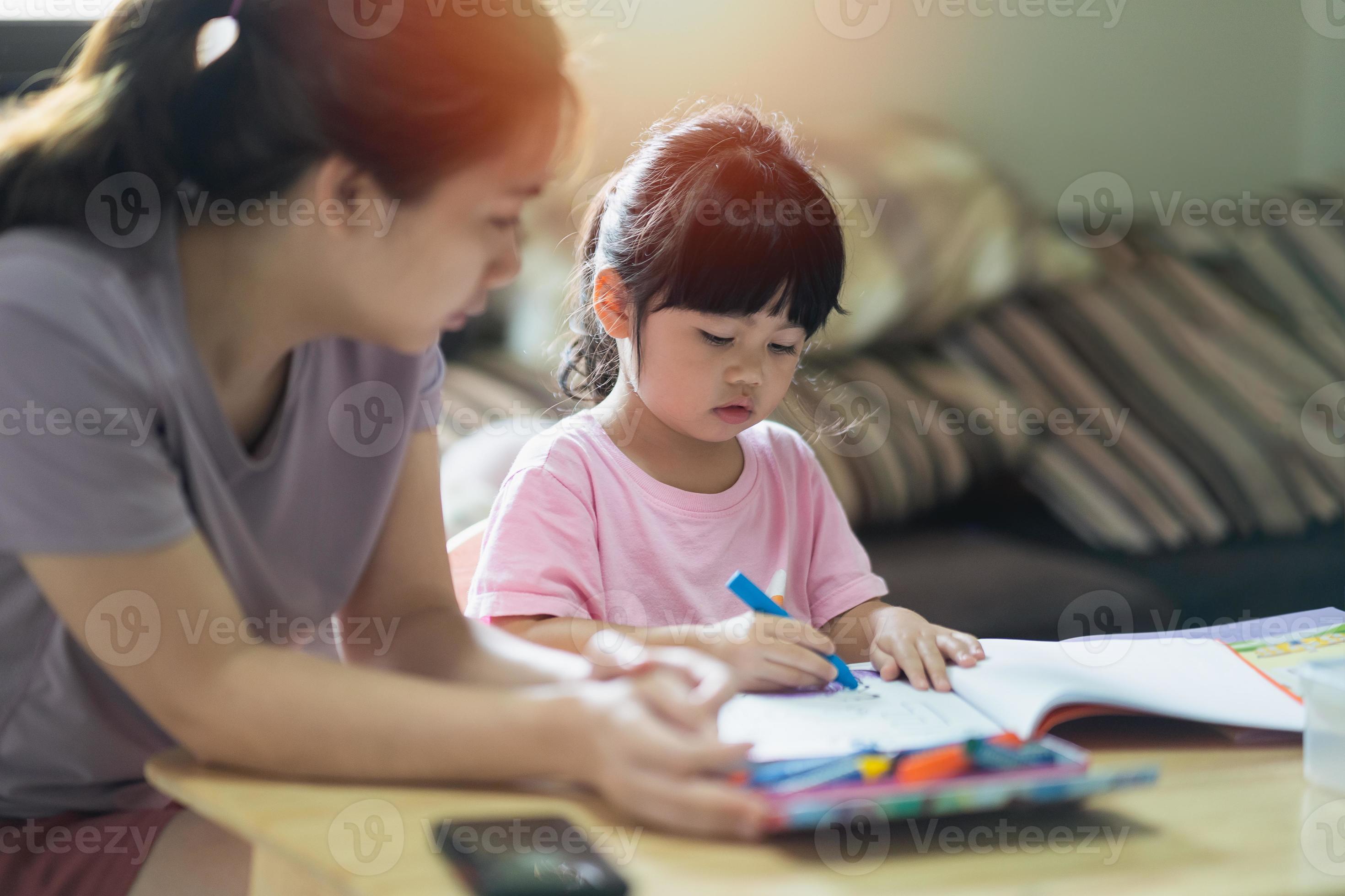 Cute little child painting with colorful paints. Asian girl and her mother  using crayon drawing color.Baby artist activity lifestyle concept. 9274863  Stock Photo at Vecteezy