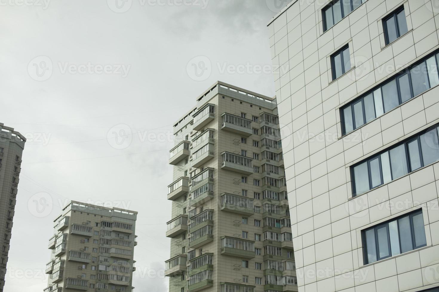 Houses in city. Tall houses. photo