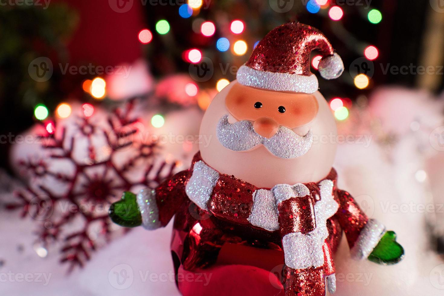 Christmas Santa decorations in festive holiday lights photo