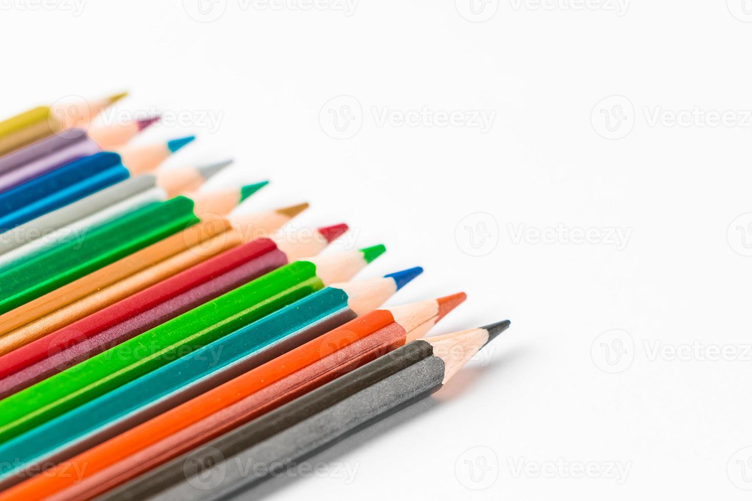 Set of colored pencils on white background. Back to school concept. Place for text. photo