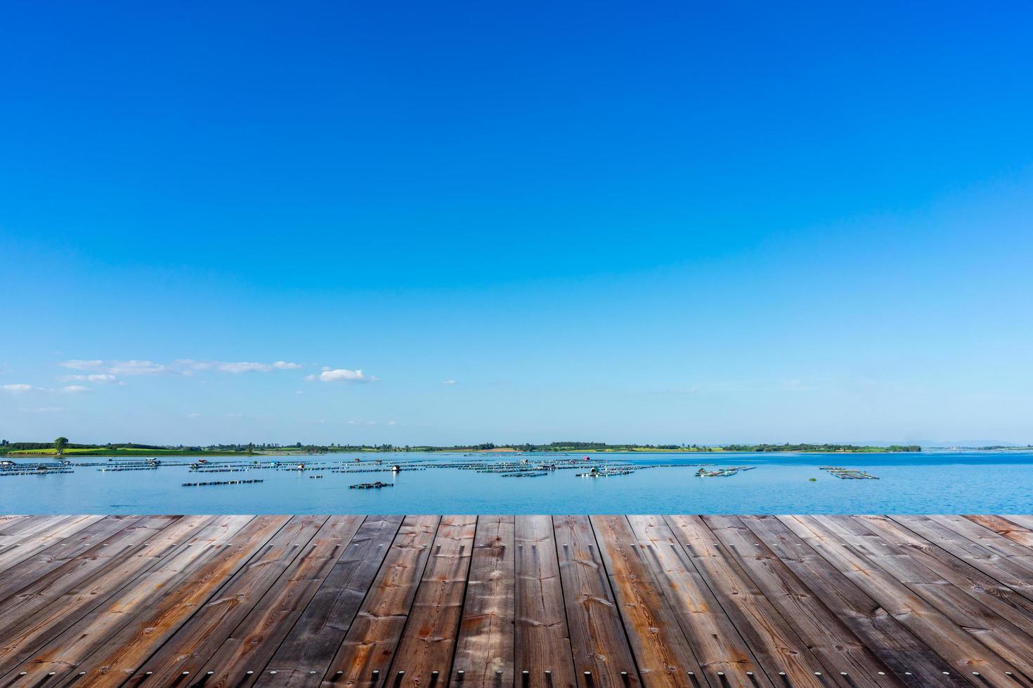 Empty wood floor with landscape background. photo