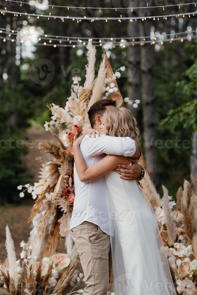 wedding ceremony of the marriage of a guy and a girl photo