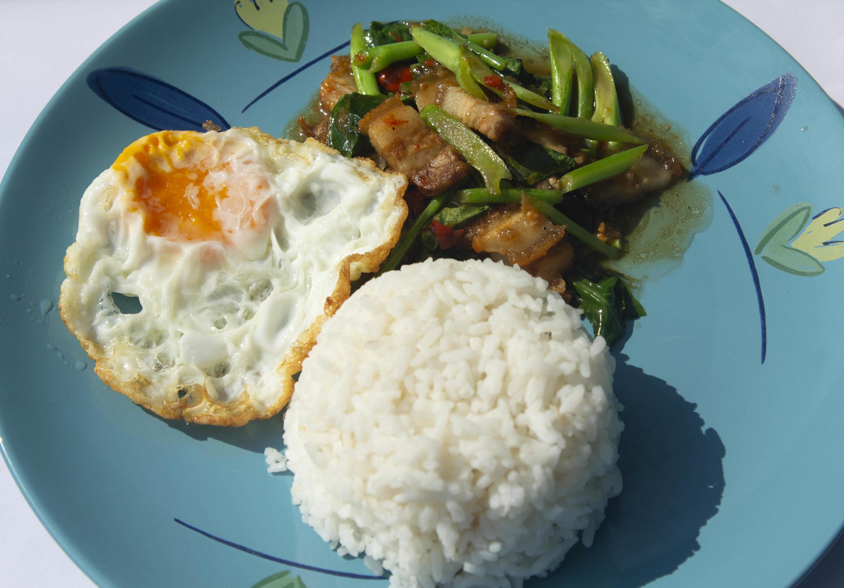 Crispy pork kale fried egg is a spicy and delicious Thai dish that is