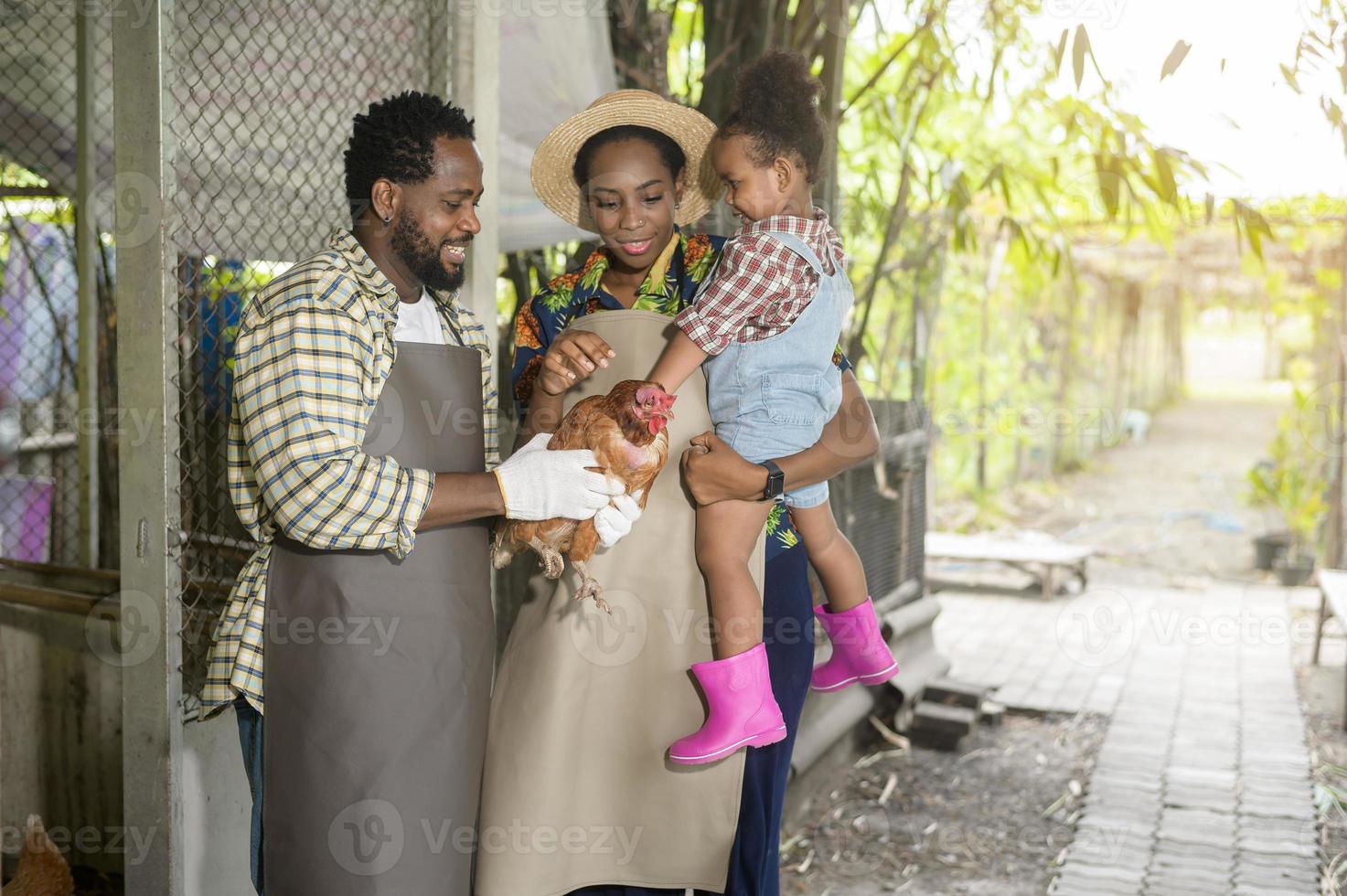 Happy black agronomist family enjoying and working in farmland, agriculture concept photo