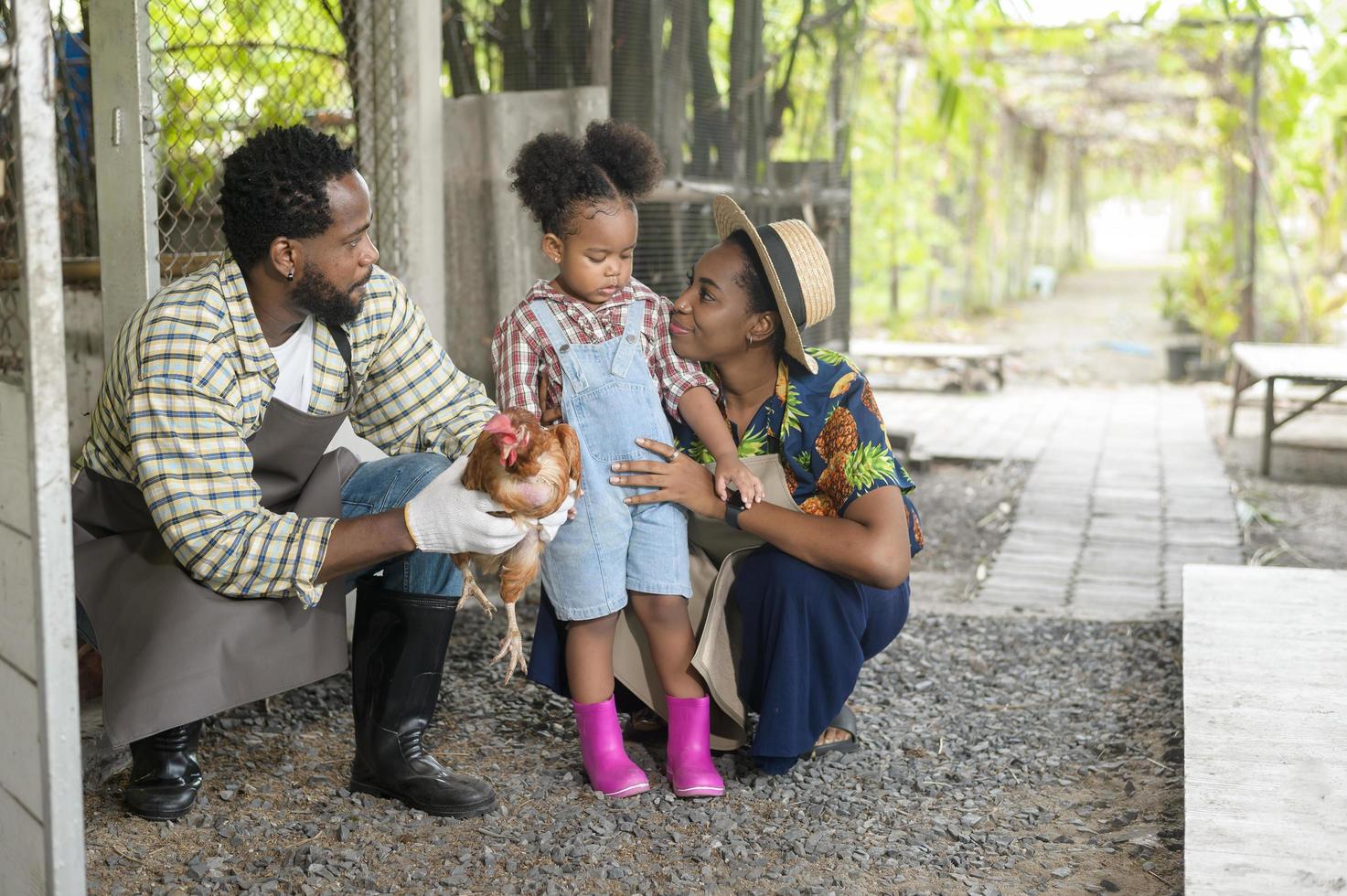 Happy black agronomist family enjoying and working in farmland, agriculture concept photo