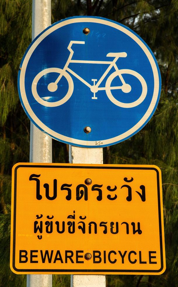 Traffic signs for drivers and cyclists are bicycle lanes that alternate traveling and exercising in the community. Please be careful of bicycles using the route. photo