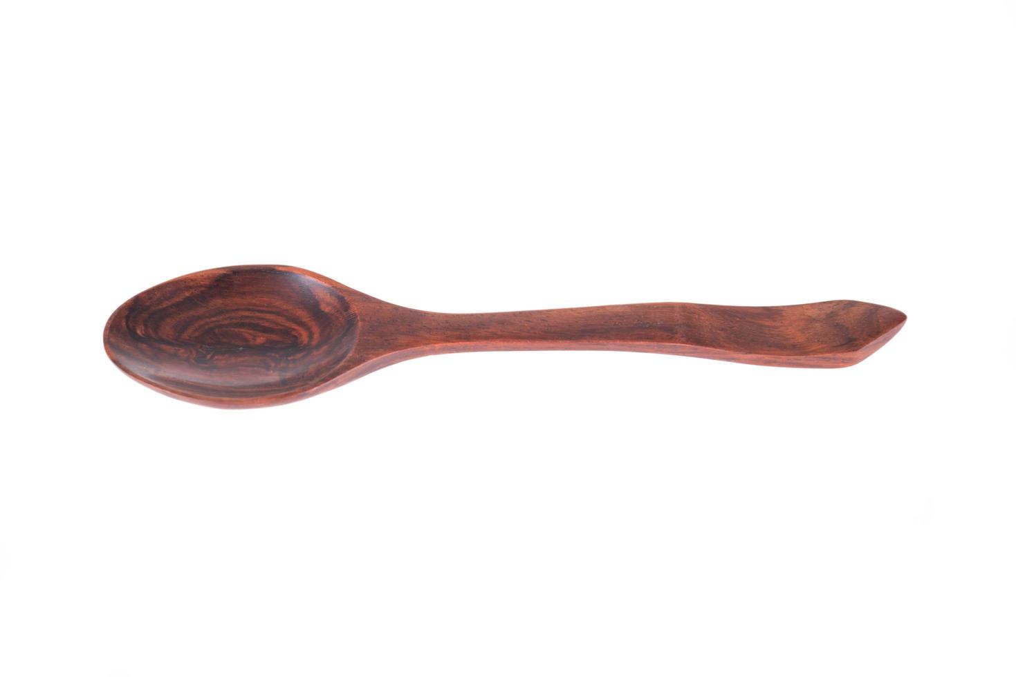 Wooden Spoon Isolated on a white background photo