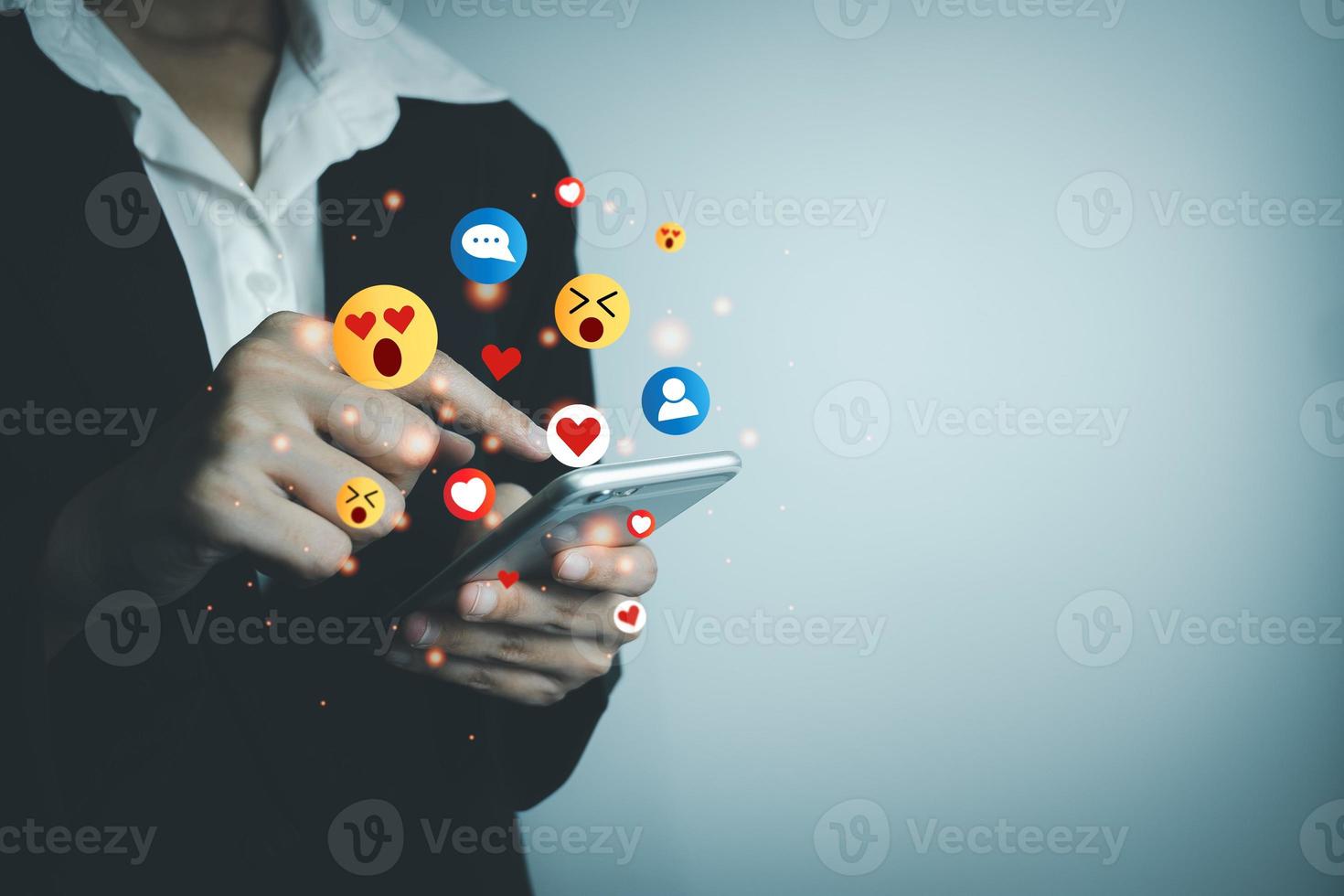 Concept of using digital media, technology, social media online surfing, woman's hand using smartphone to use the internet, work from home for social distancing. photo