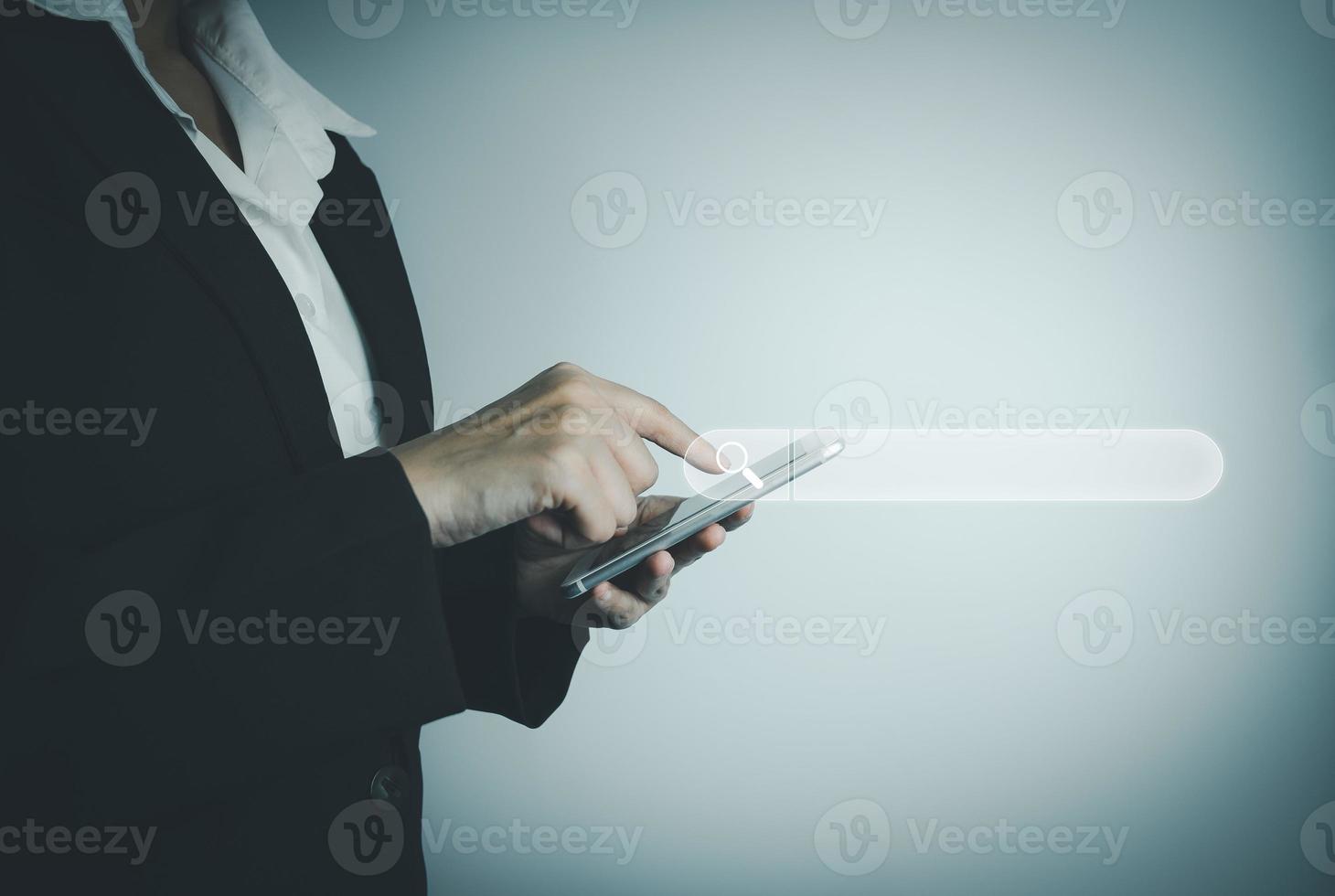 Search Engine optimization SEO concept, Businesswoman is using smartphone to search for information on Internet, Using the search bar, Wireless Network, big data and accessing website information. photo