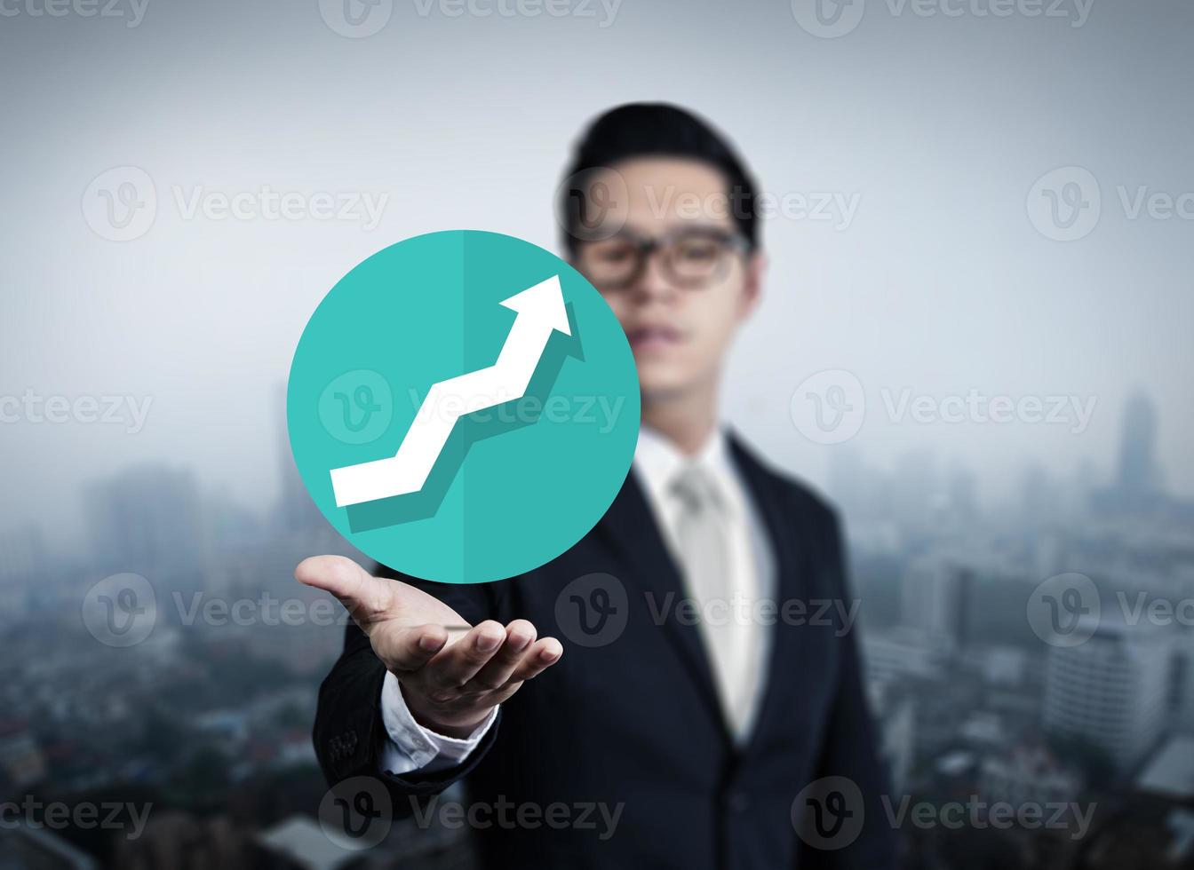 Businessman hand holding Graph, new business in the city collection, studio shot photo