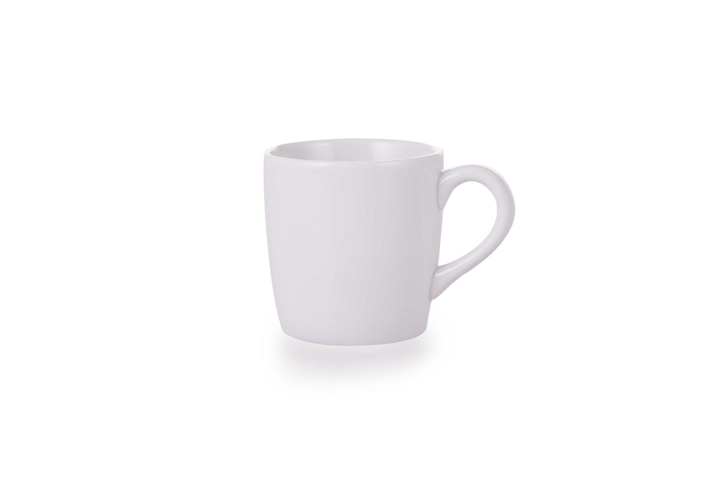 White ceramic mug on white background photo