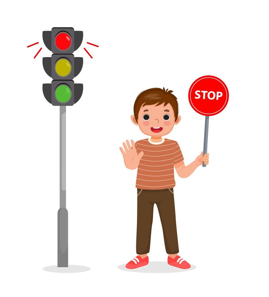 cute little boy holding stop sign board showing traffic light indicator red light on vector