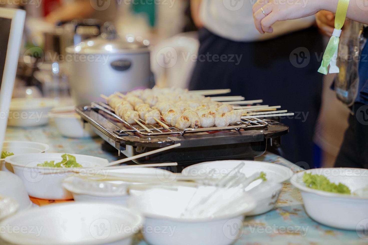 grilled meat ball on the elctric grilling. photo