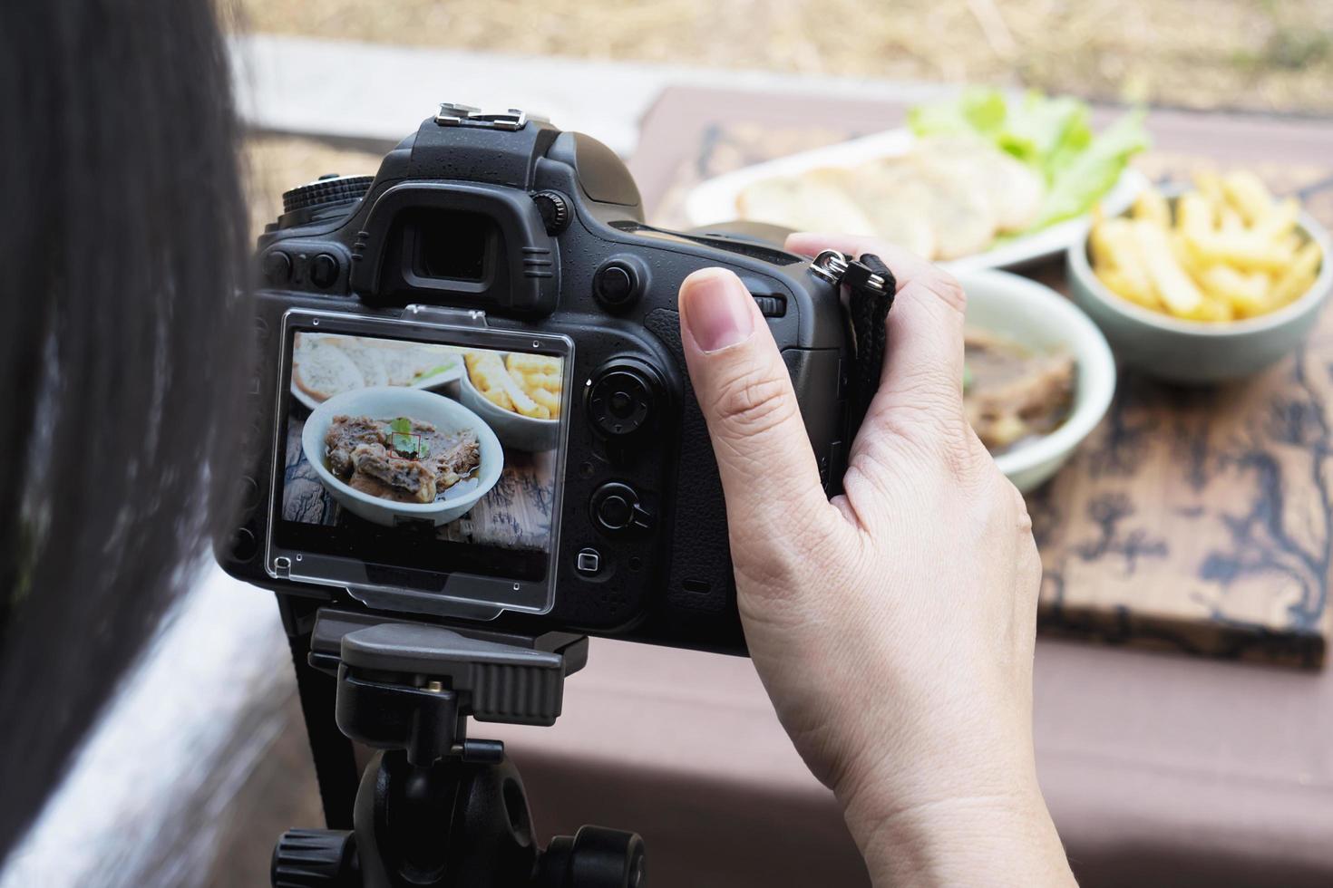 People using digital camera taking food photograph or video product photo