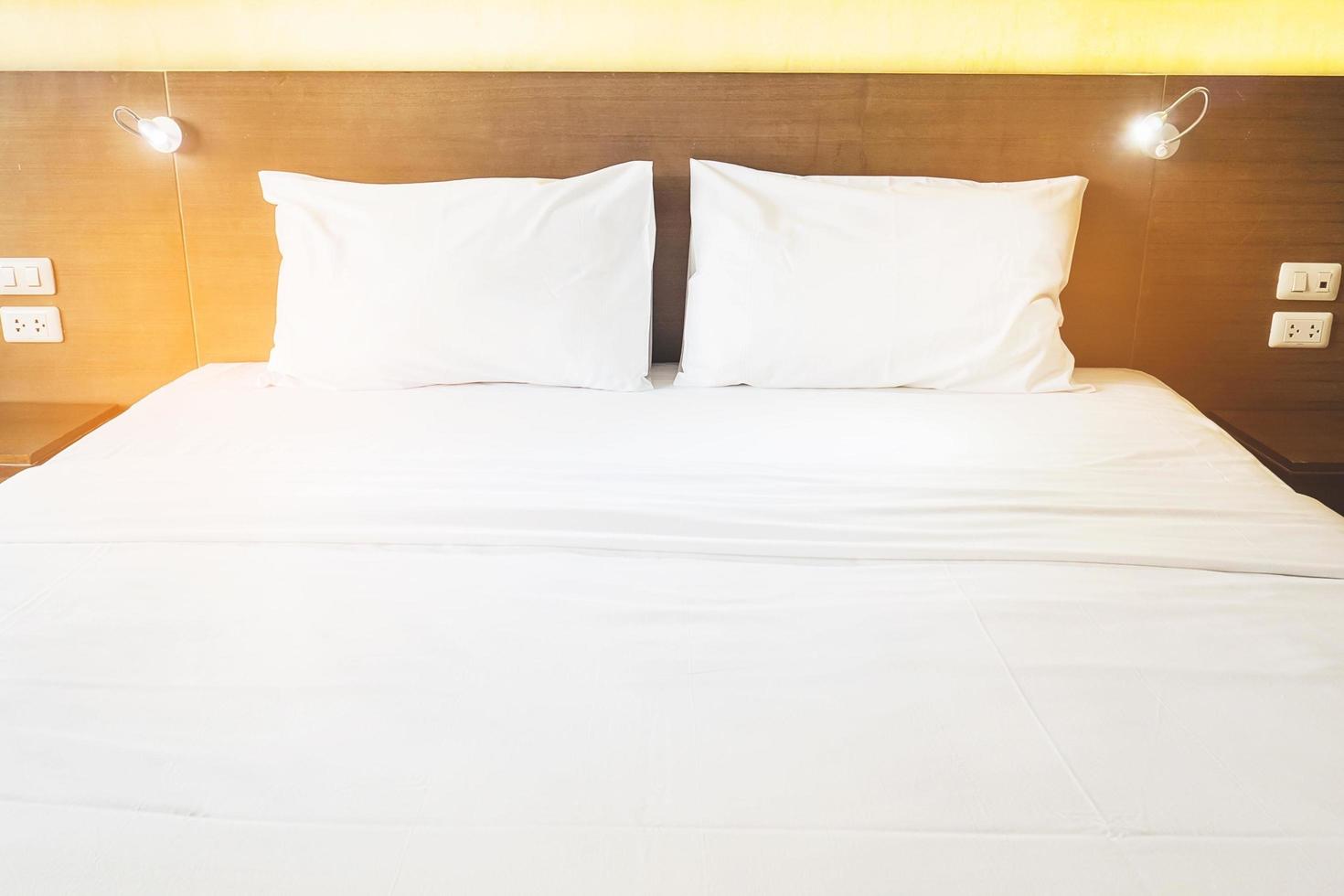 White cloth bedding set in clean modern hotel photo