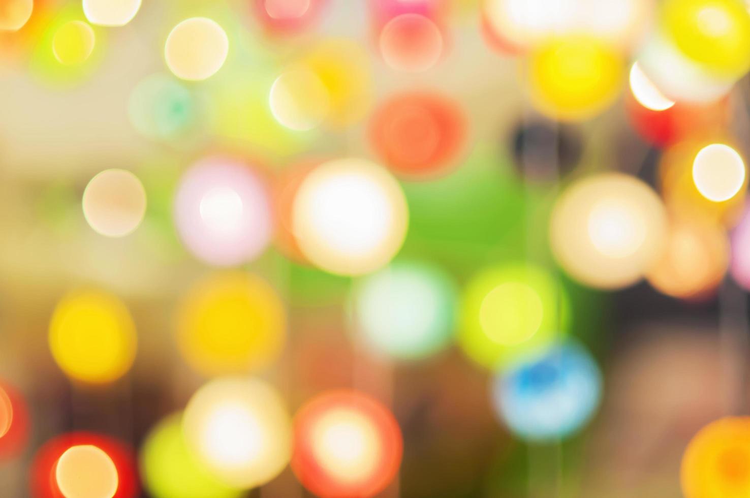 Blurred bokeh of colorful light for background use photo