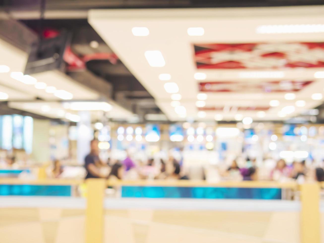 Blurred photo of food court and people in a superstore