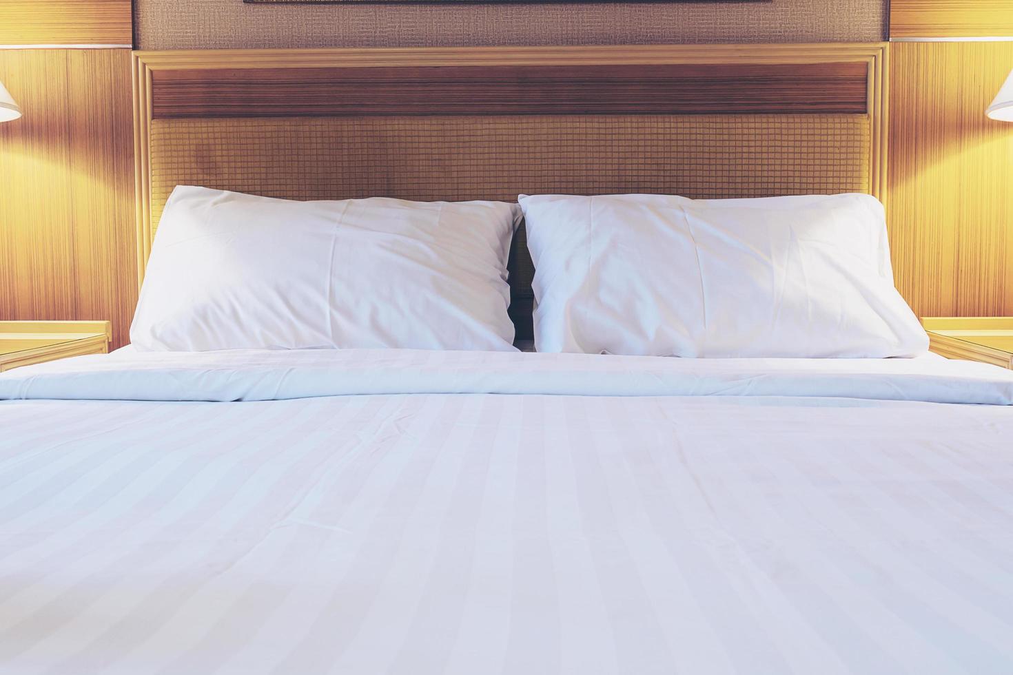 White bedding and towel set in modern hotel photo