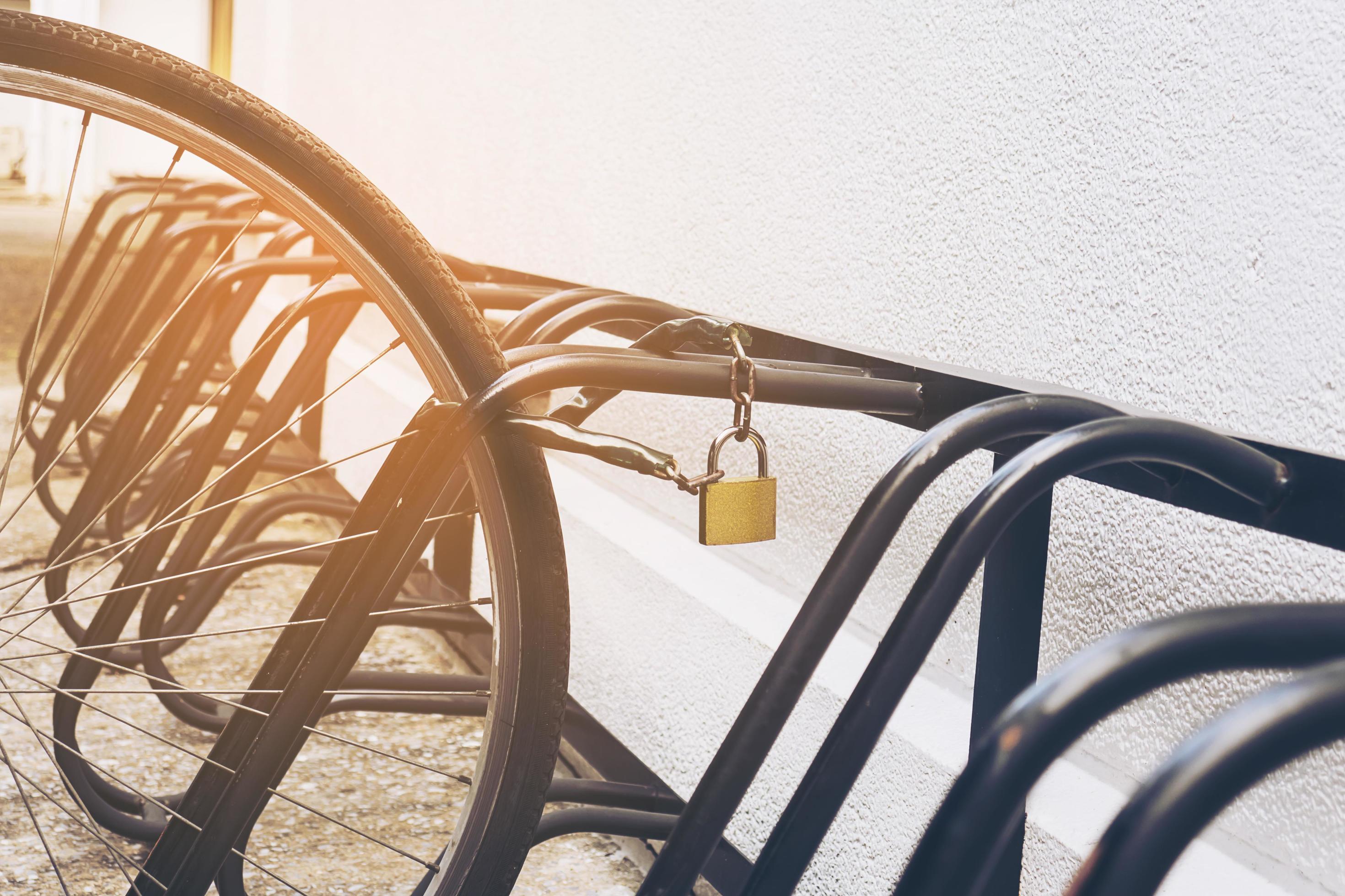 Security chain key lock for bicycle wheel in campus 9298831 Stock Photo