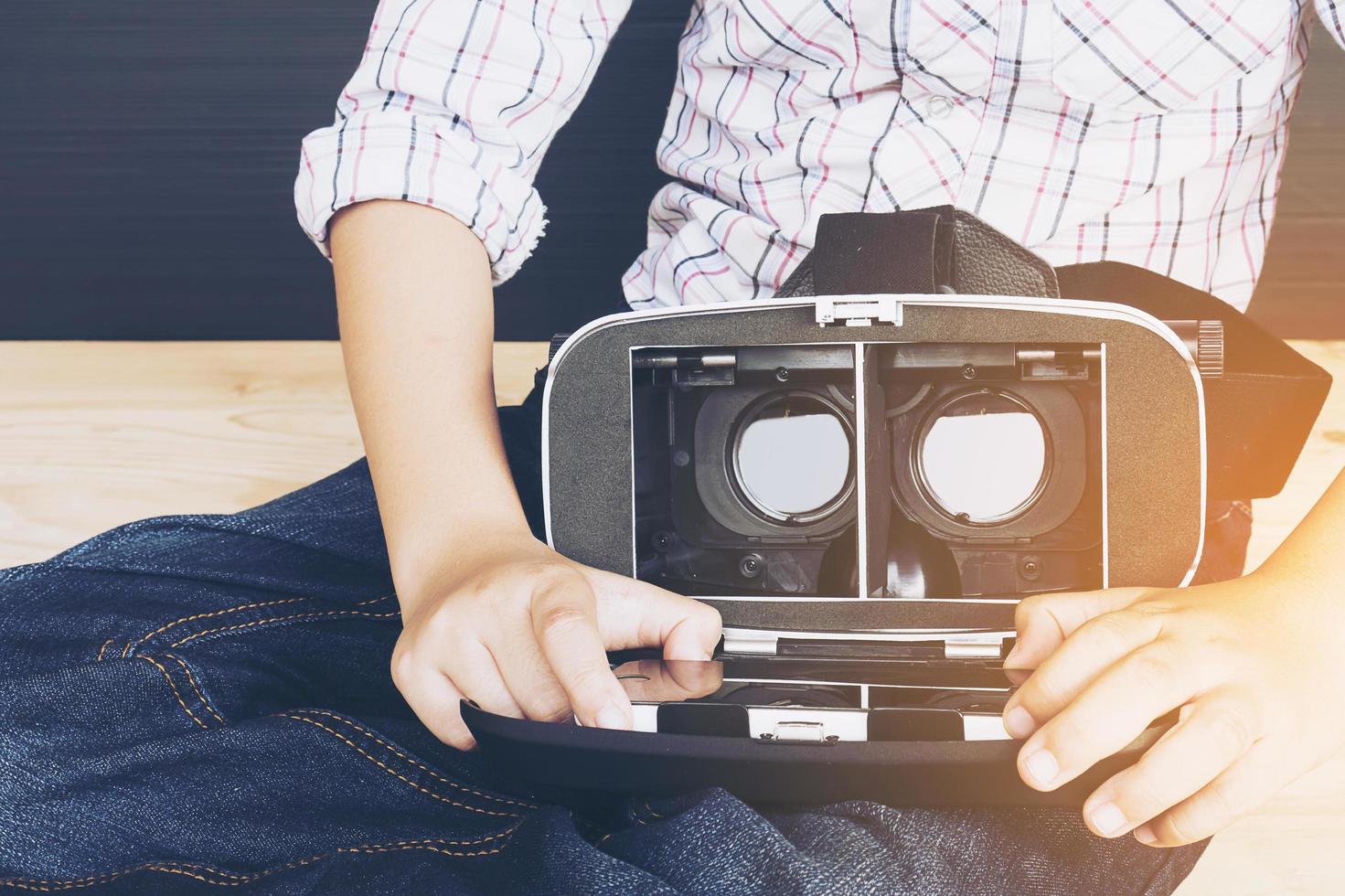 7 years kid playing VR virtual reality game photo