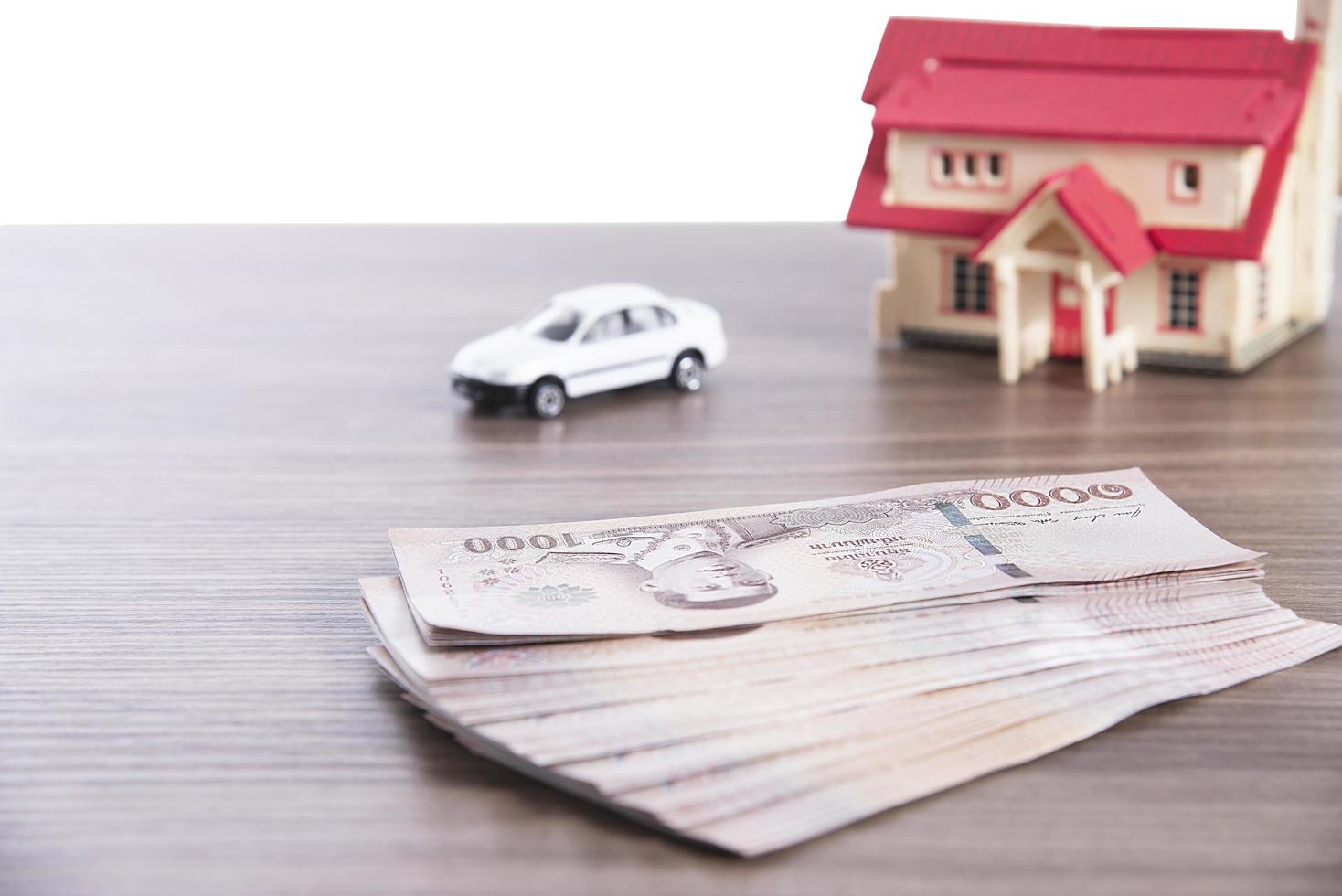 House and car payment - people with real estate financial insurance concept photo