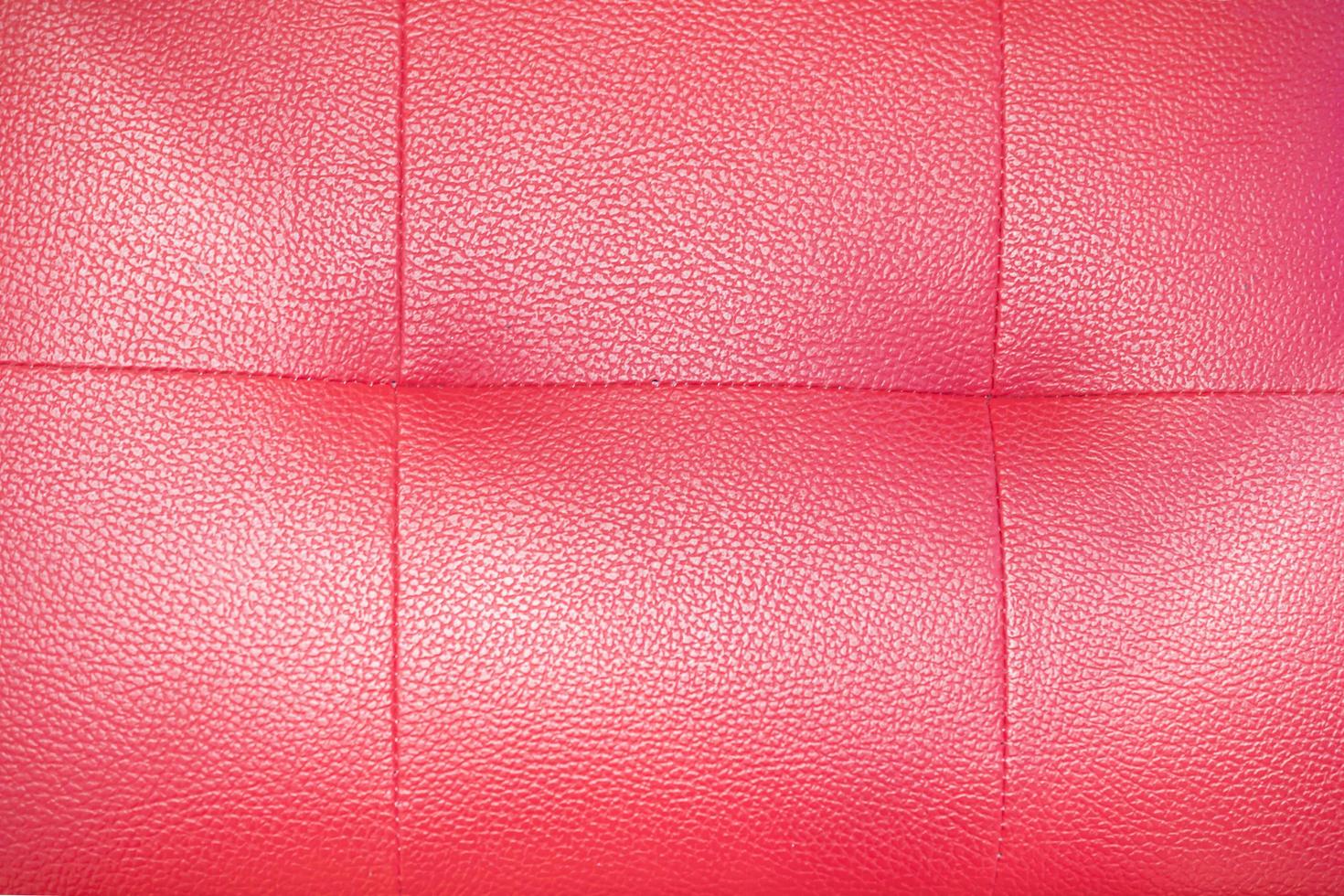 Red sofa cover lather texture background photo