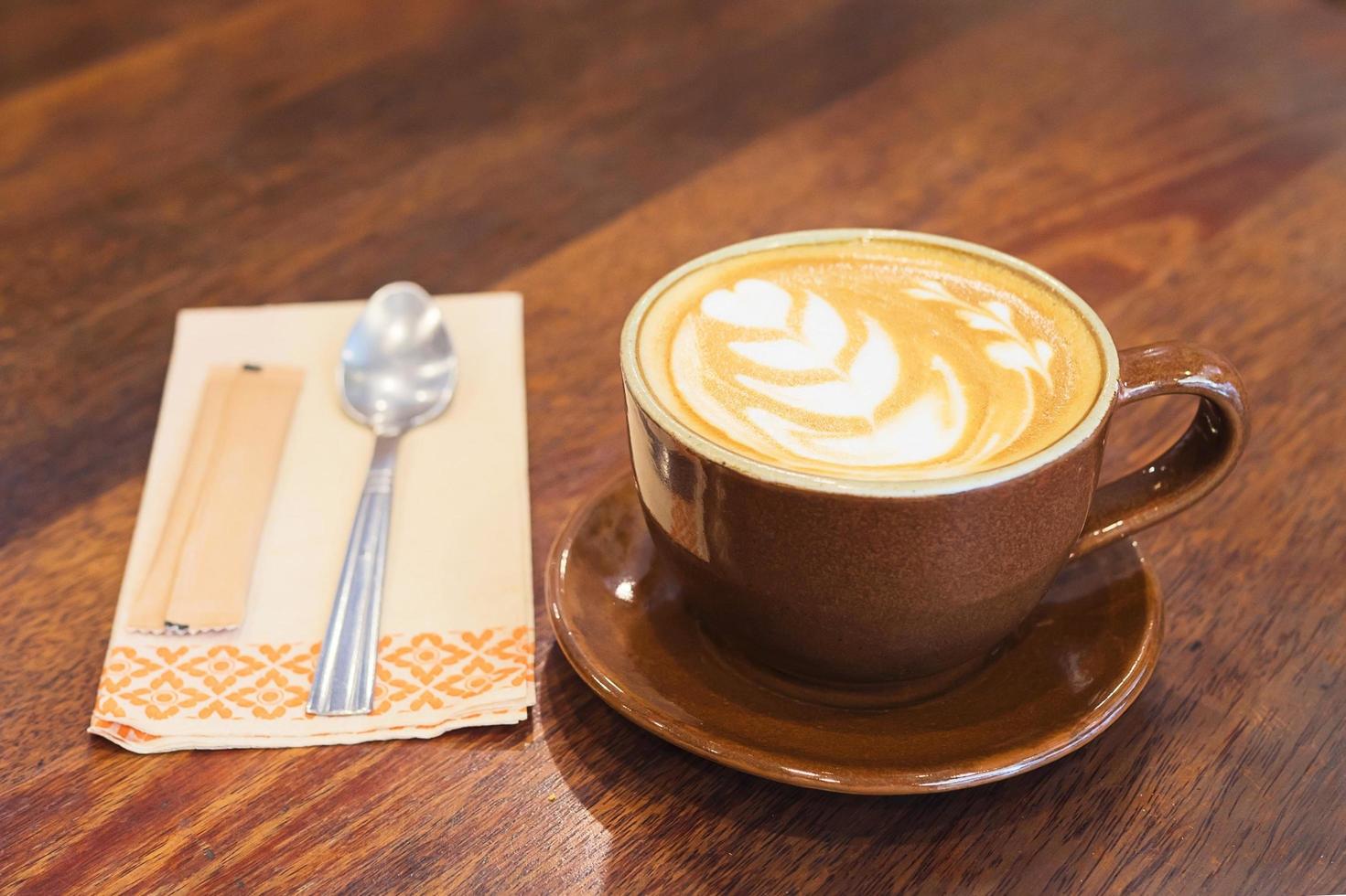 Vintage coffee with Latte art decoration photo