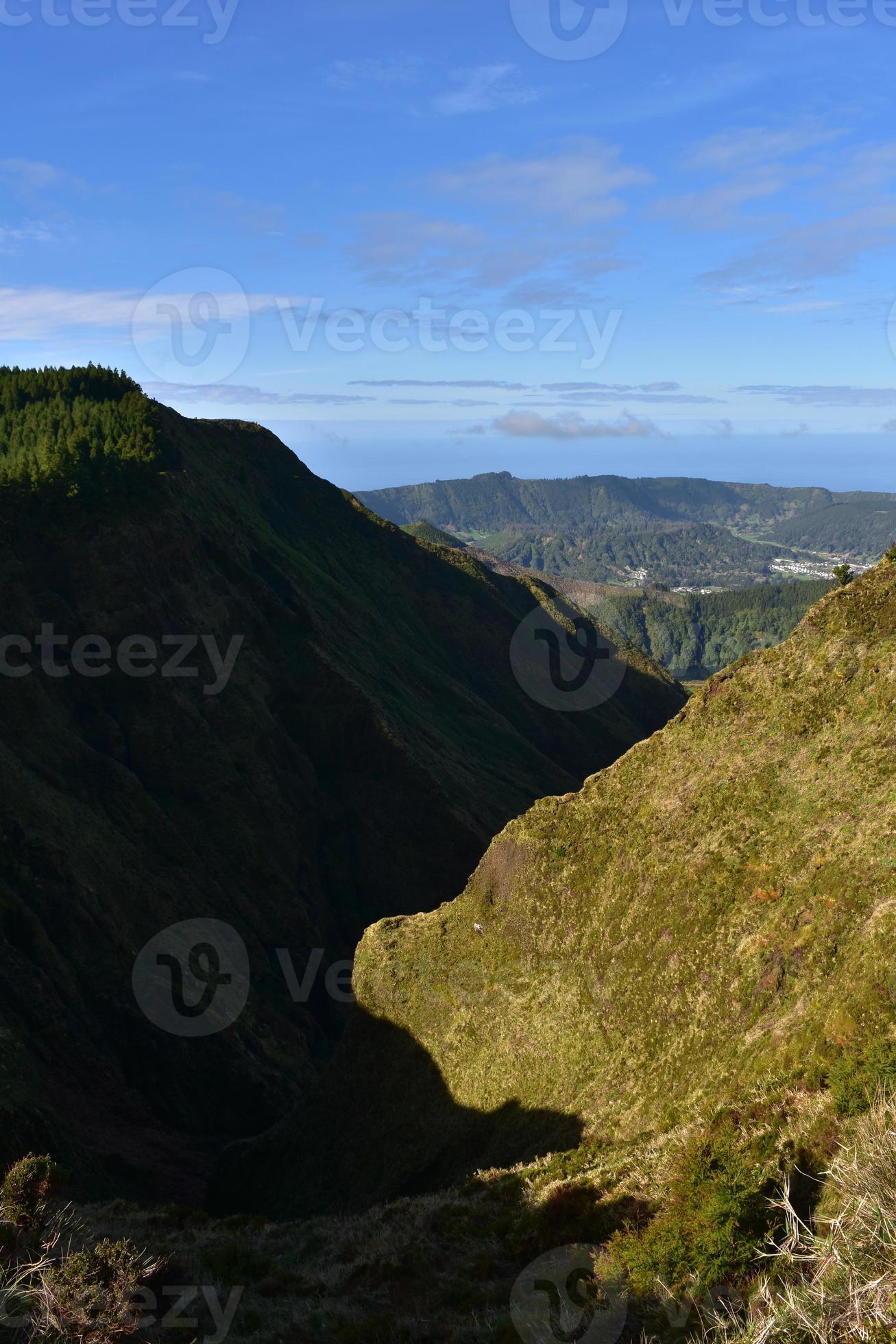 Deep Valley Between Two Hills in the Azores 9301357 Stock Photo at Vecteezy