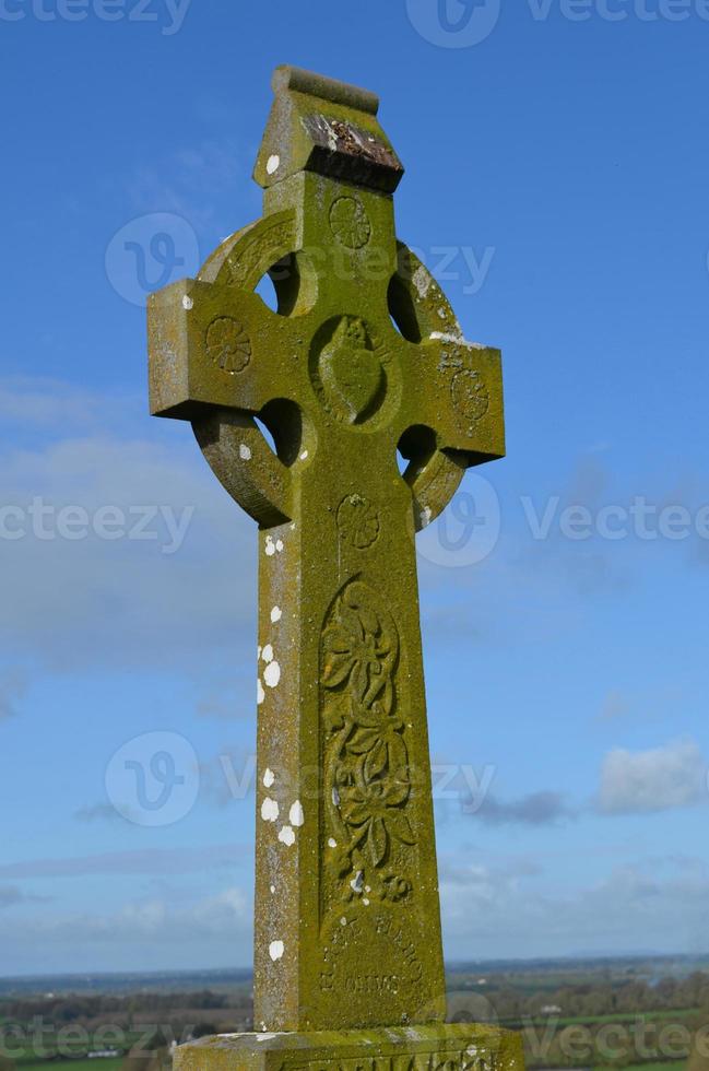 Celtic Cross at the Rock of Cashel in Ireland photo