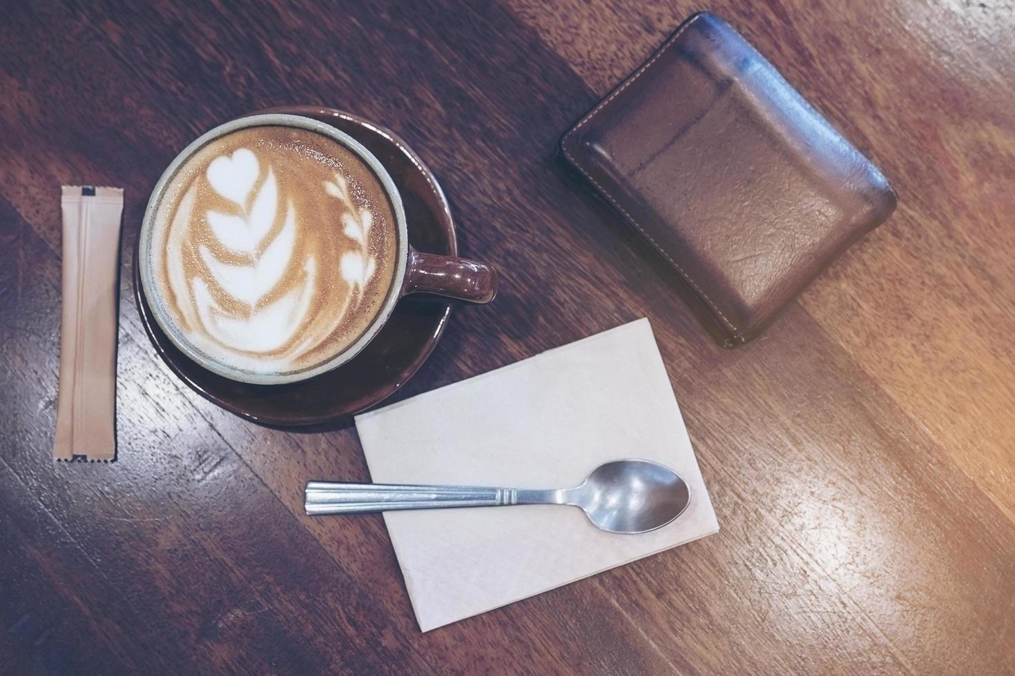 Vintage coffee with Latte art decoration photo