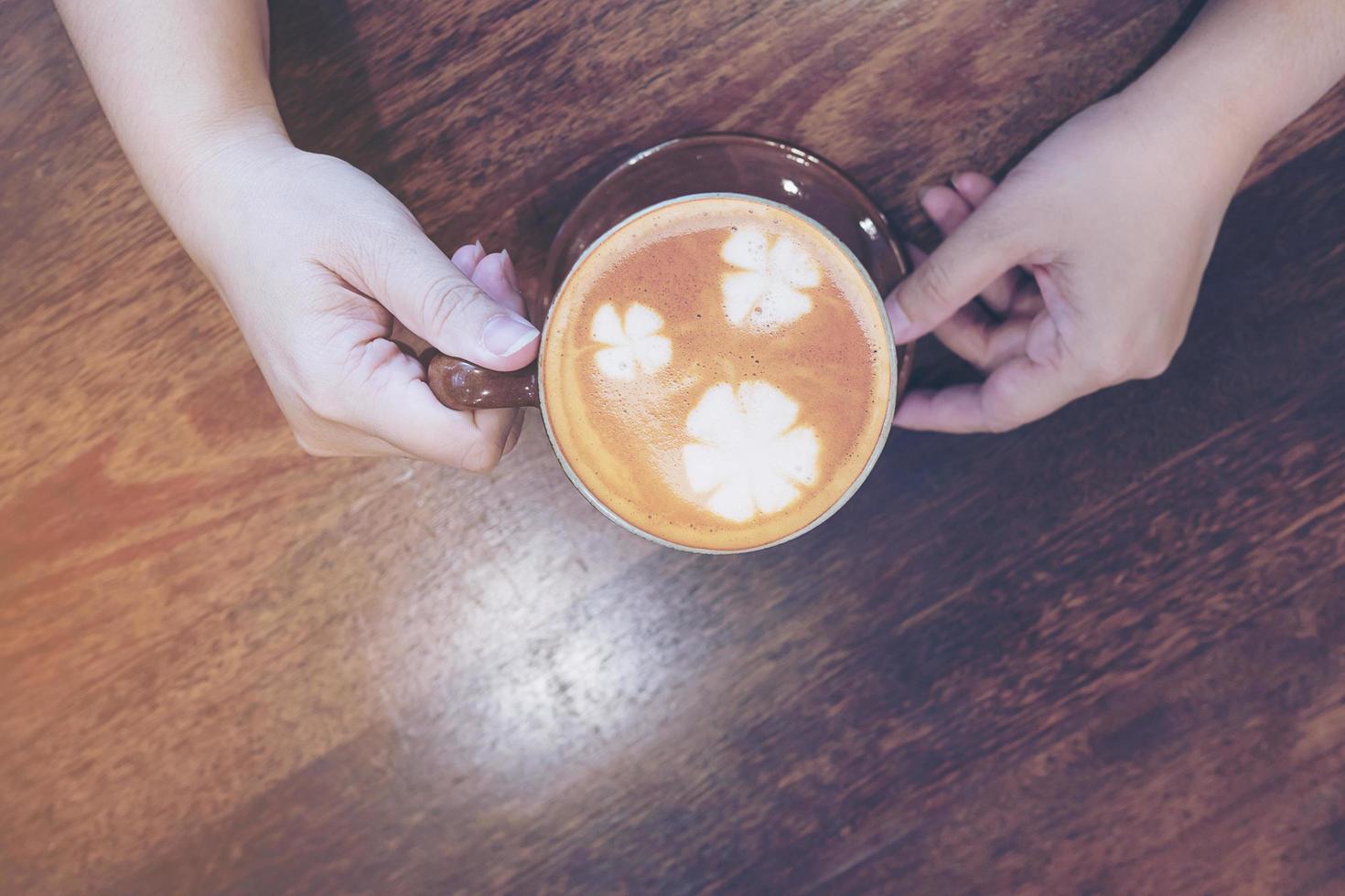 Vintage coffee with Latte art decoration photo