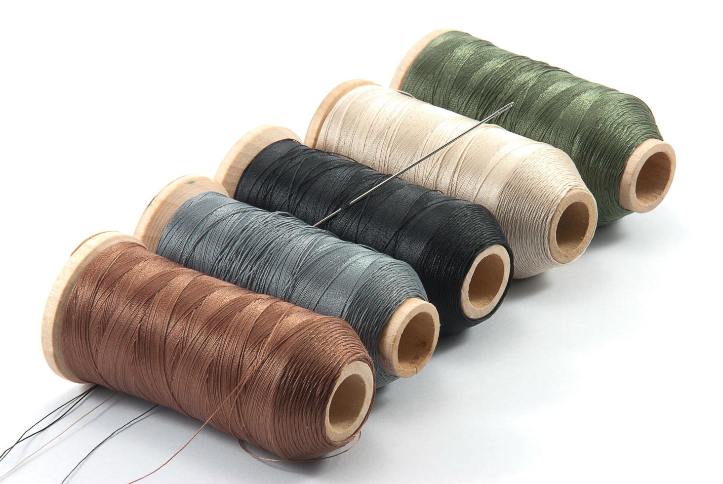 Isolated spools of thread photo