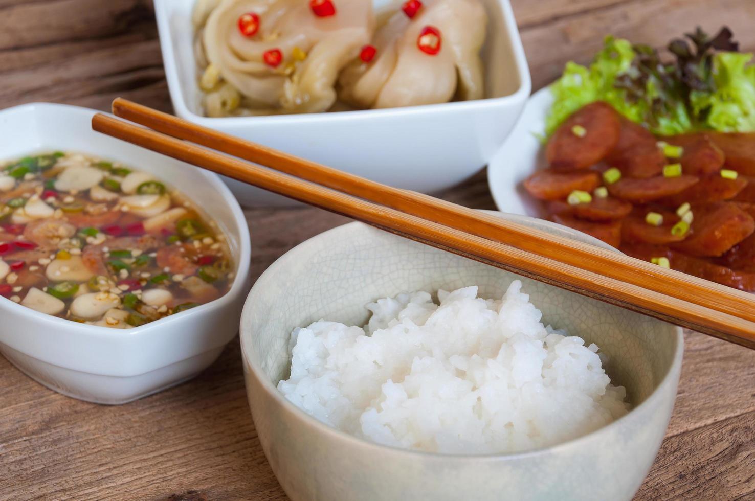 Soft boil rice with other food in Thai style photo