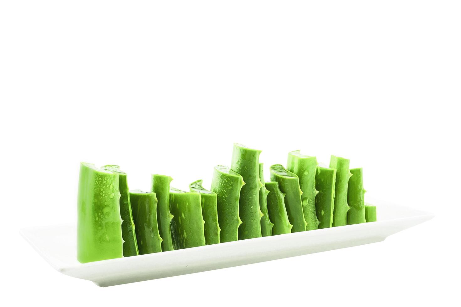 Fresh sliced aloe vera isolated over white. Photo includes CLIPPING PATH.