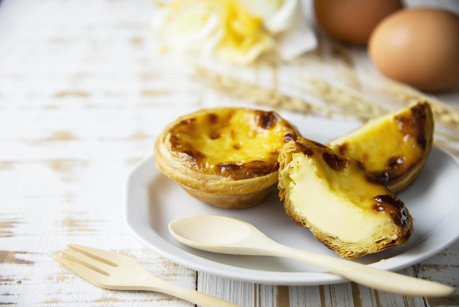 Egg tart recipe - famous dessert cooking concept photo