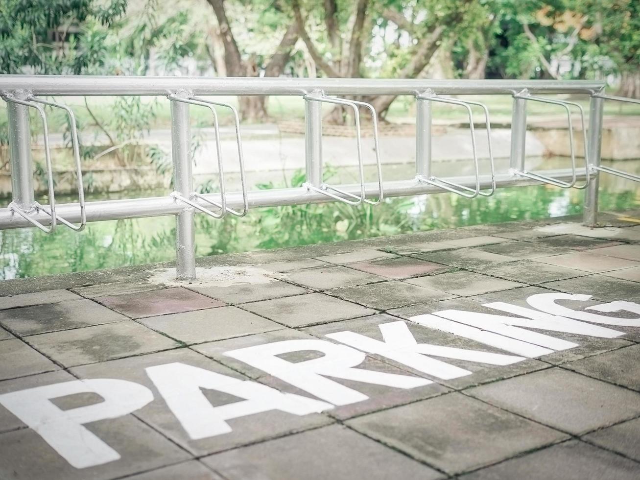 Vintage style photo of bicycle parking area in a campus, selective focused