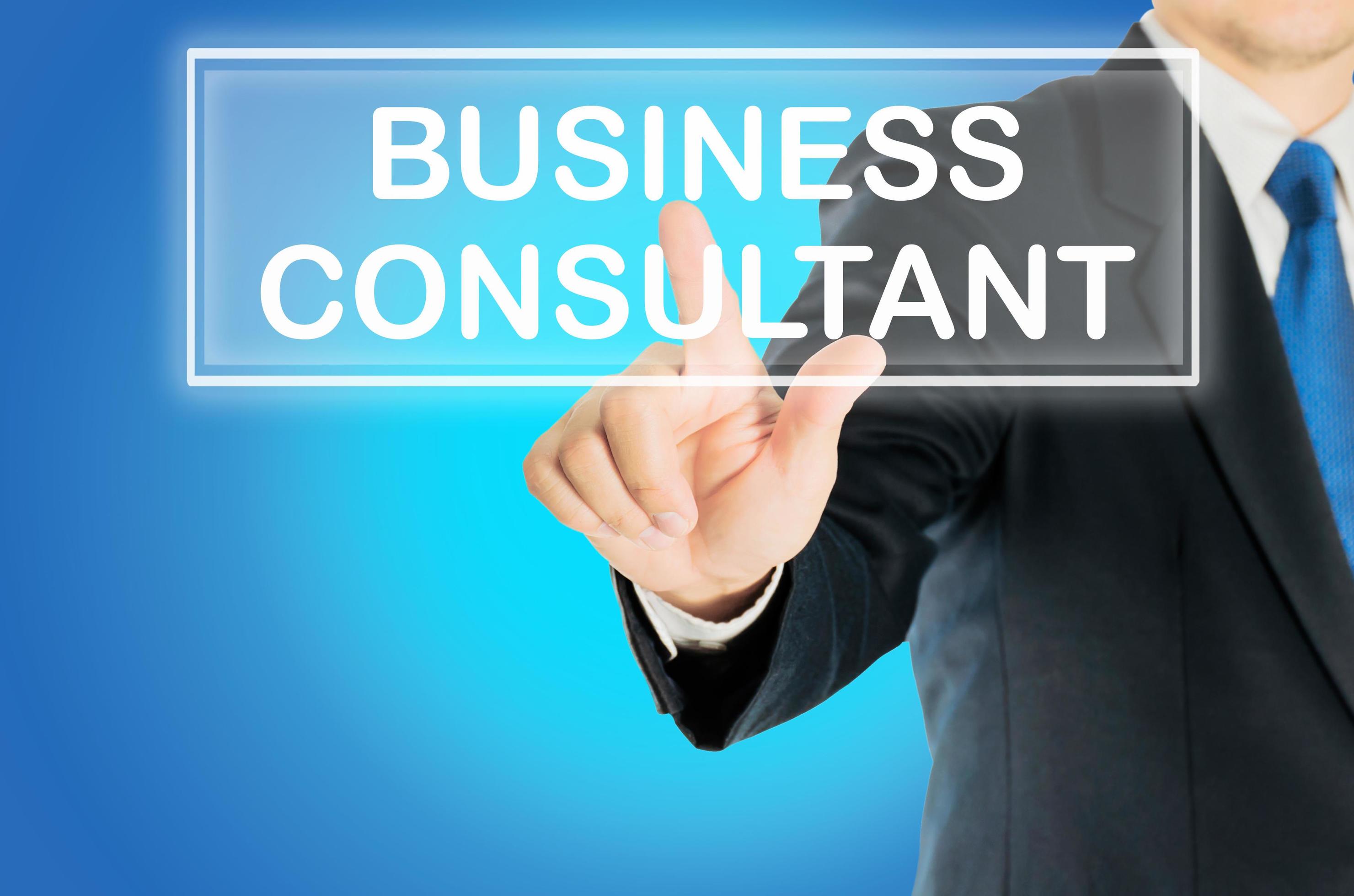Business man is pushing BUSINESS CONSULTANT transparent button word Business man is pushing BUSINESS CONSULTANT transparent button word
