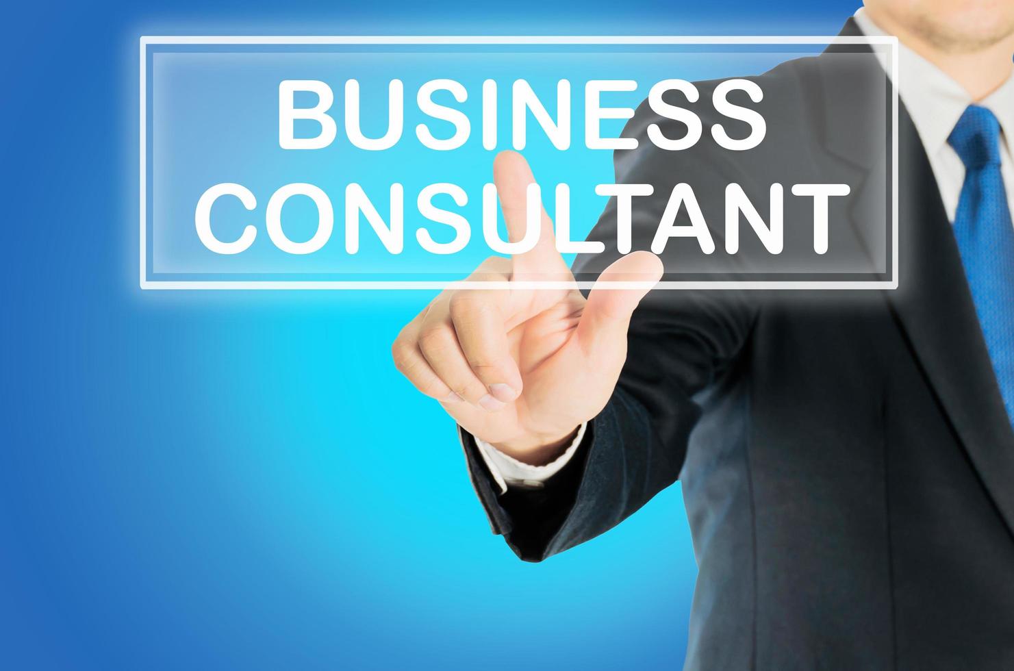 Business man is pushing BUSINESS CONSULTANT transparent button word over blue gradient background, business concept photo