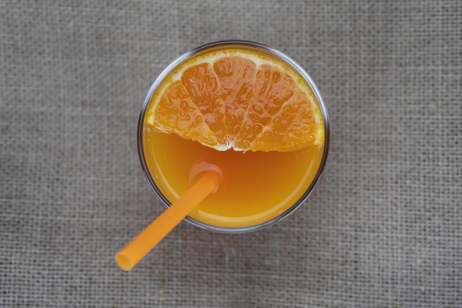 Fresh orange juice fruit drink glass over white background - tropical orange fruit for background use photo