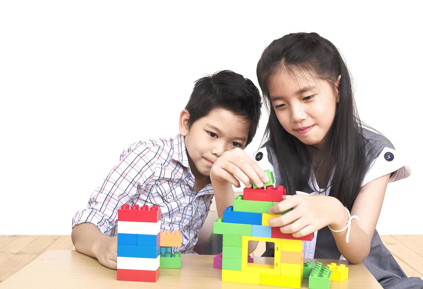 Kids playing pieces plastic creative construction blocks photo