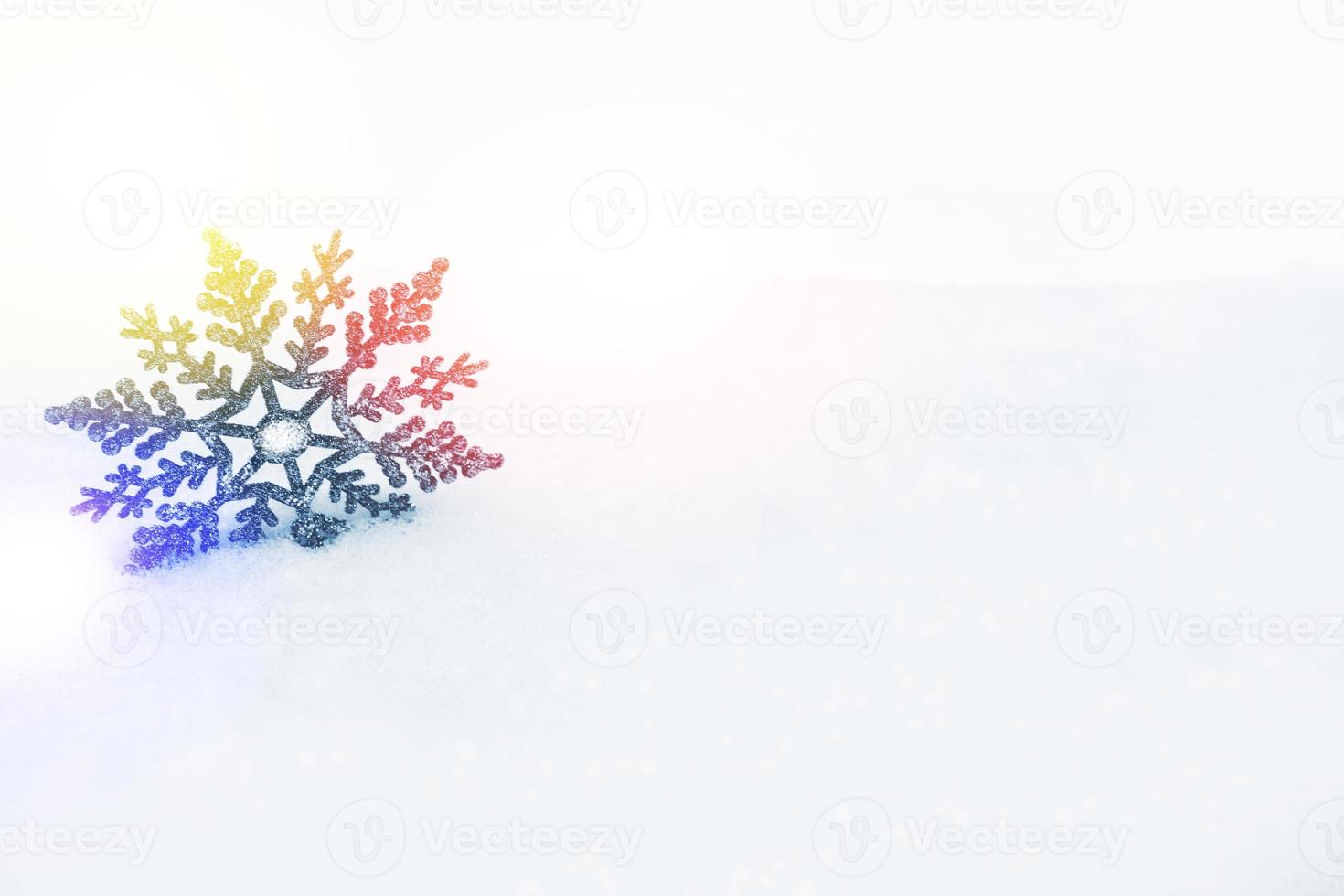 White fluffy snowflakes on snow. Winter christmas background. photo