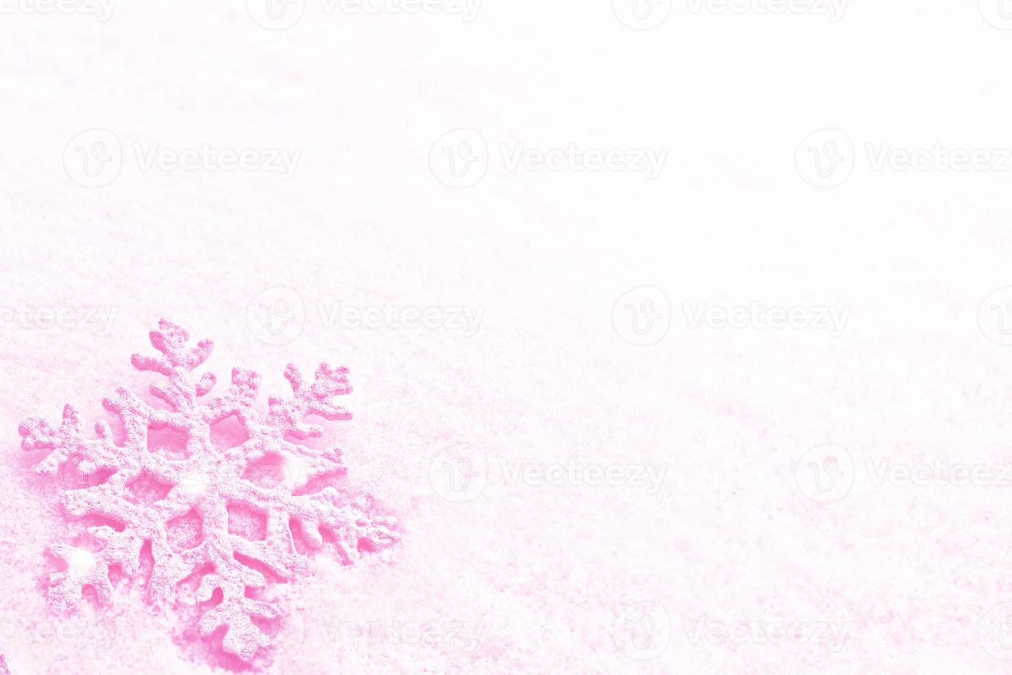 White fluffy snowflakes on snow. Winter christmas background. photo
