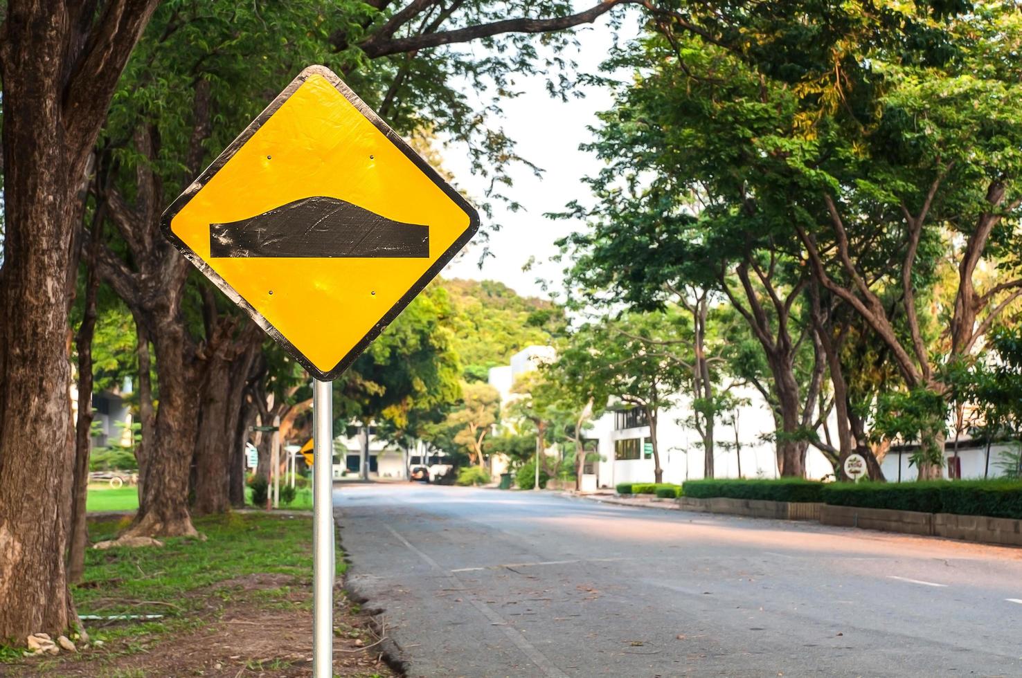 Hump road sign post photo