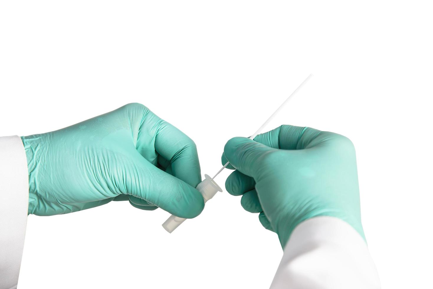 Doctor is testing with rapid antigen test, Covid -19 self repid test set, isolated over white photo