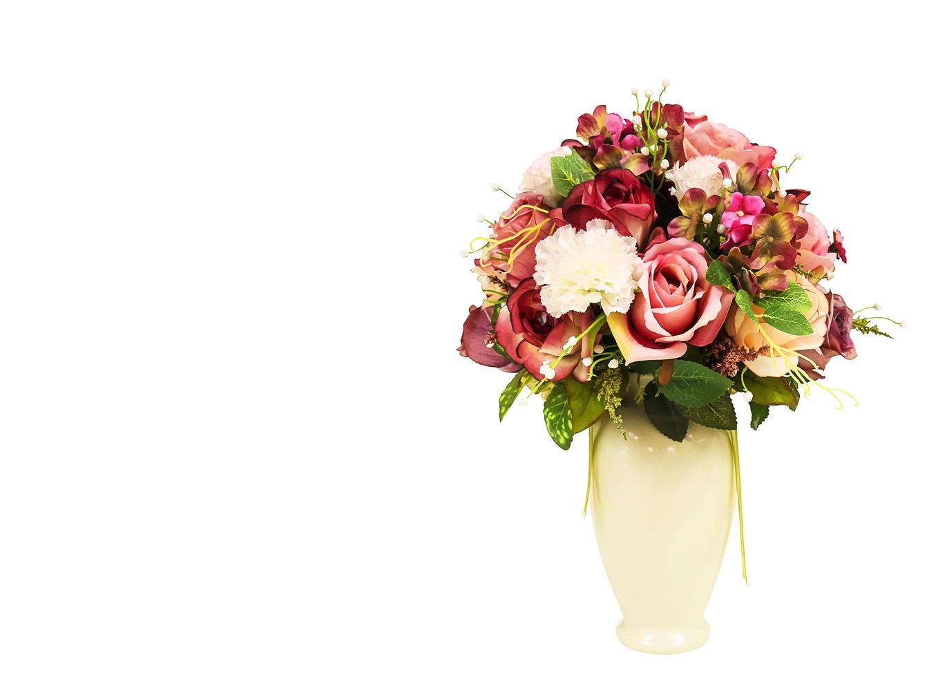 Artificial flowers in the white big vase for interior decoration over white background. photo