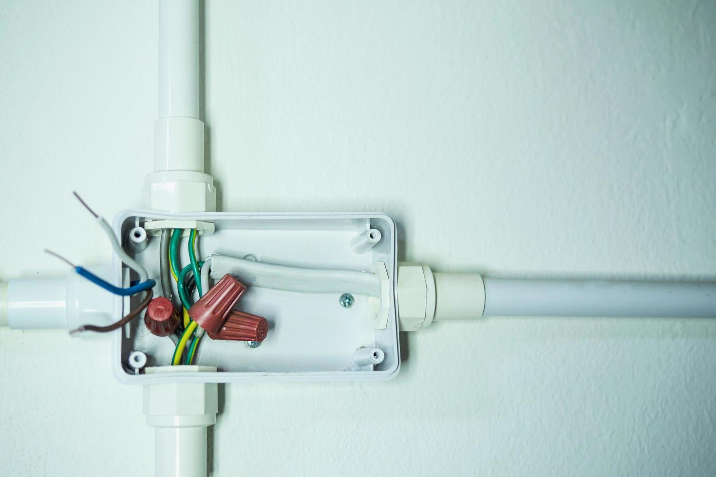 Open electric  wires connection junction box - electrical installation background photo