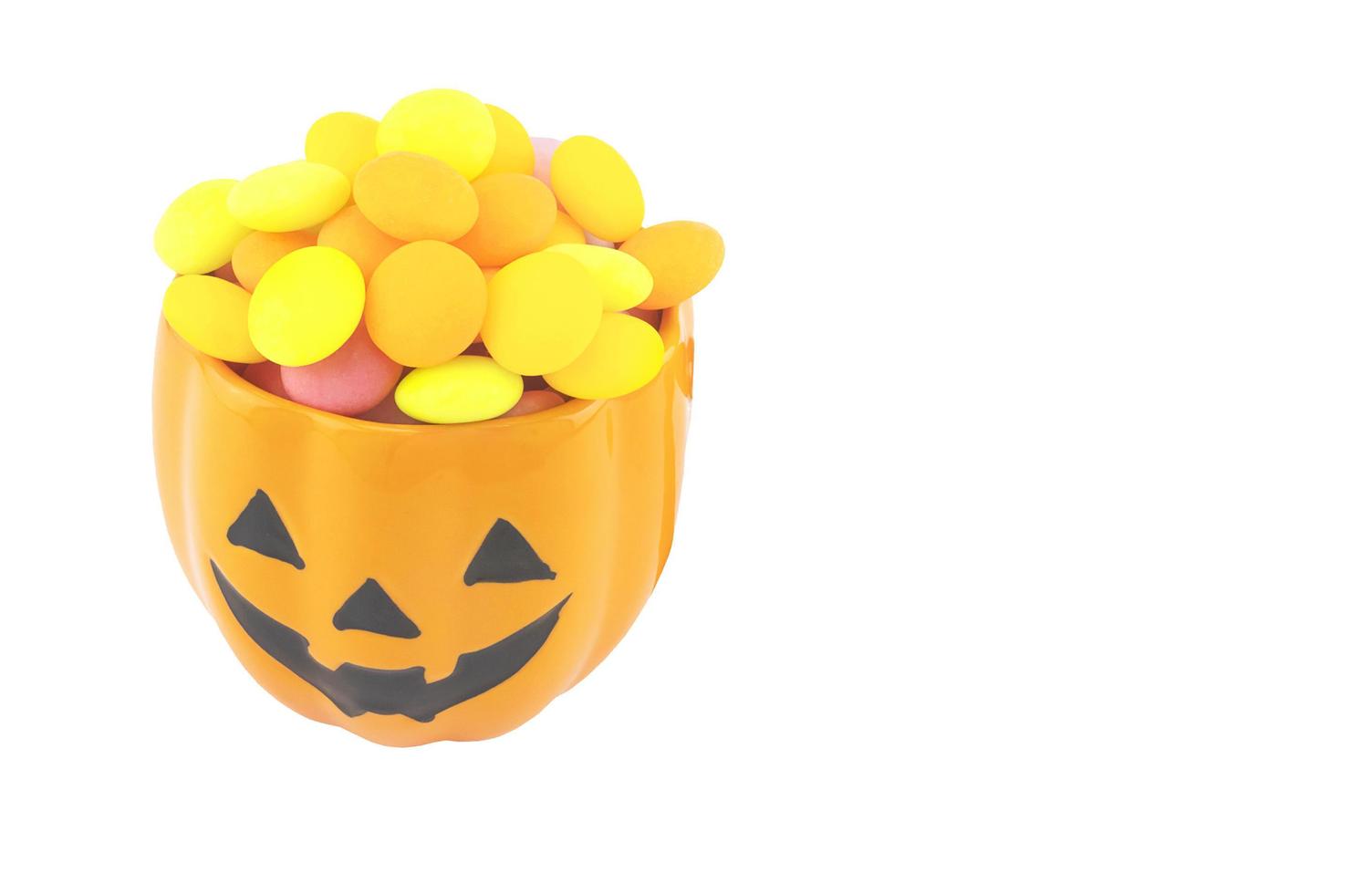 Halloween candy cup isolated over white photo