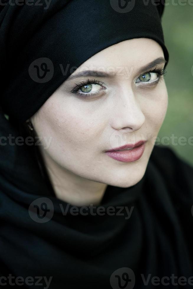 Portrait of a beautiful muslim woman. Young arabian woman in hijab. photo