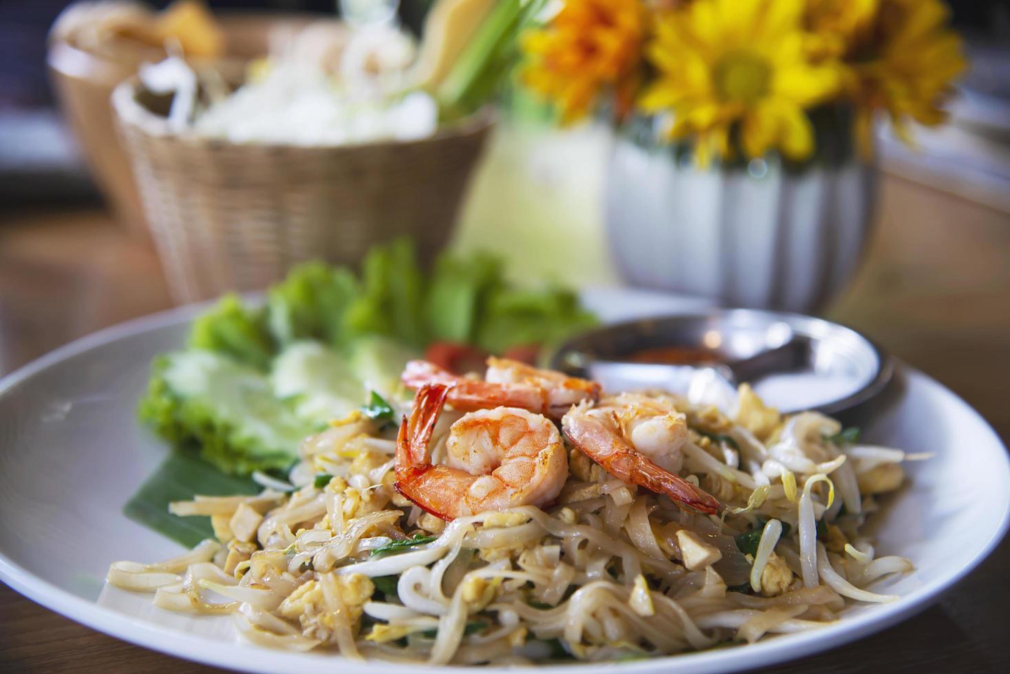 Thai fried noodle with shrimp named Pad Thai - Thai famous food recipe photo