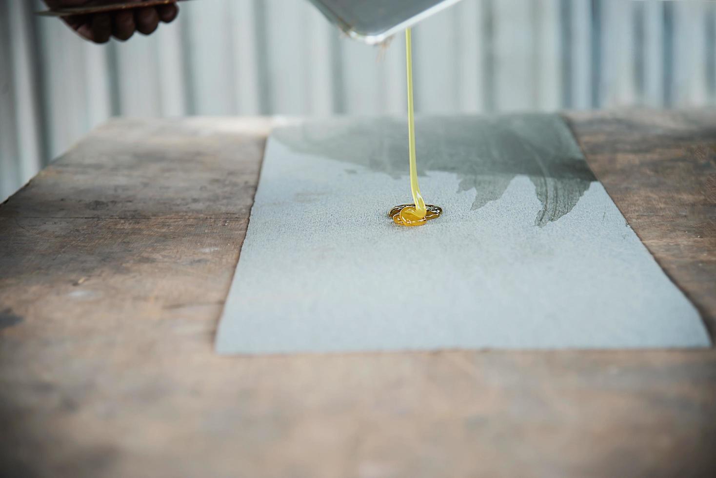 Man preparing electric router laminate trimmer machine tool - carpenter workshop concept photo